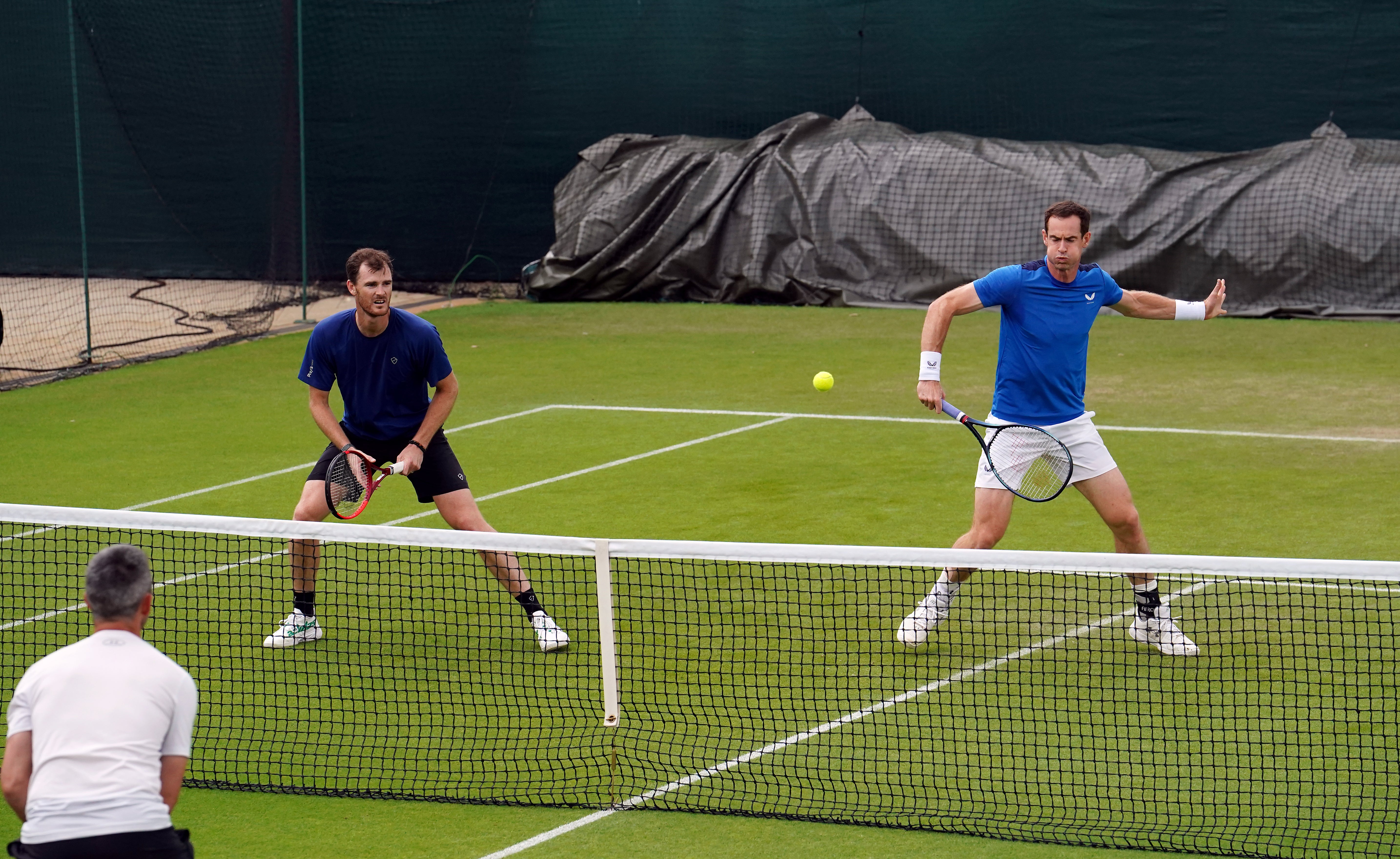 Andy Murray and Jamie Murray on the practice courts (Jordan Pettitt/PA)