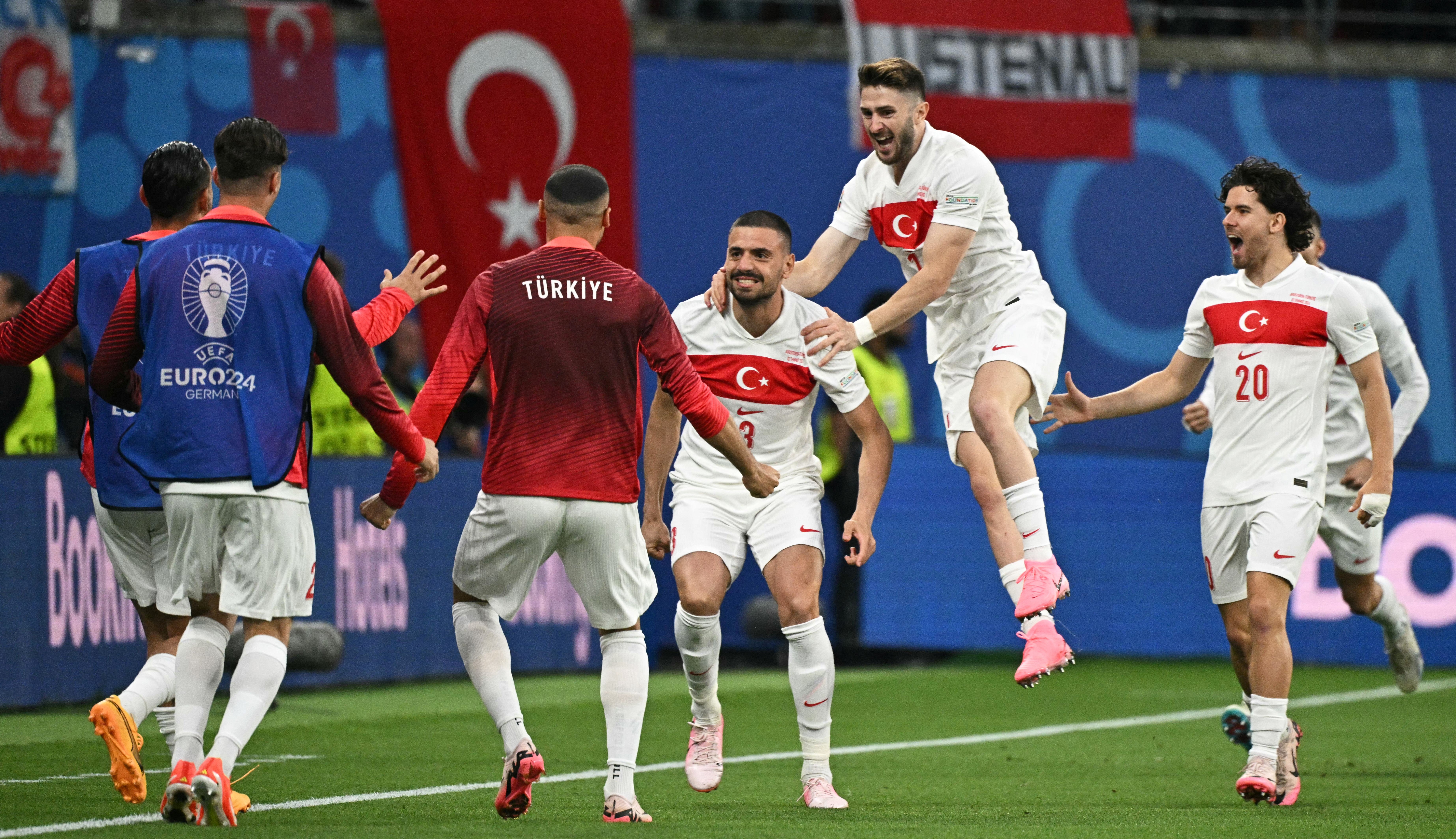 Turkey celebrate their opening goal after less than a minute
