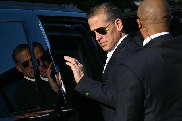 <p>Hunter Biden steps into a car in Washington DC on July 1 after returning from a trip with the Biden family to Camp David. A new report says the recently convicted felon is particiapting in Oval Office meetings </p>
