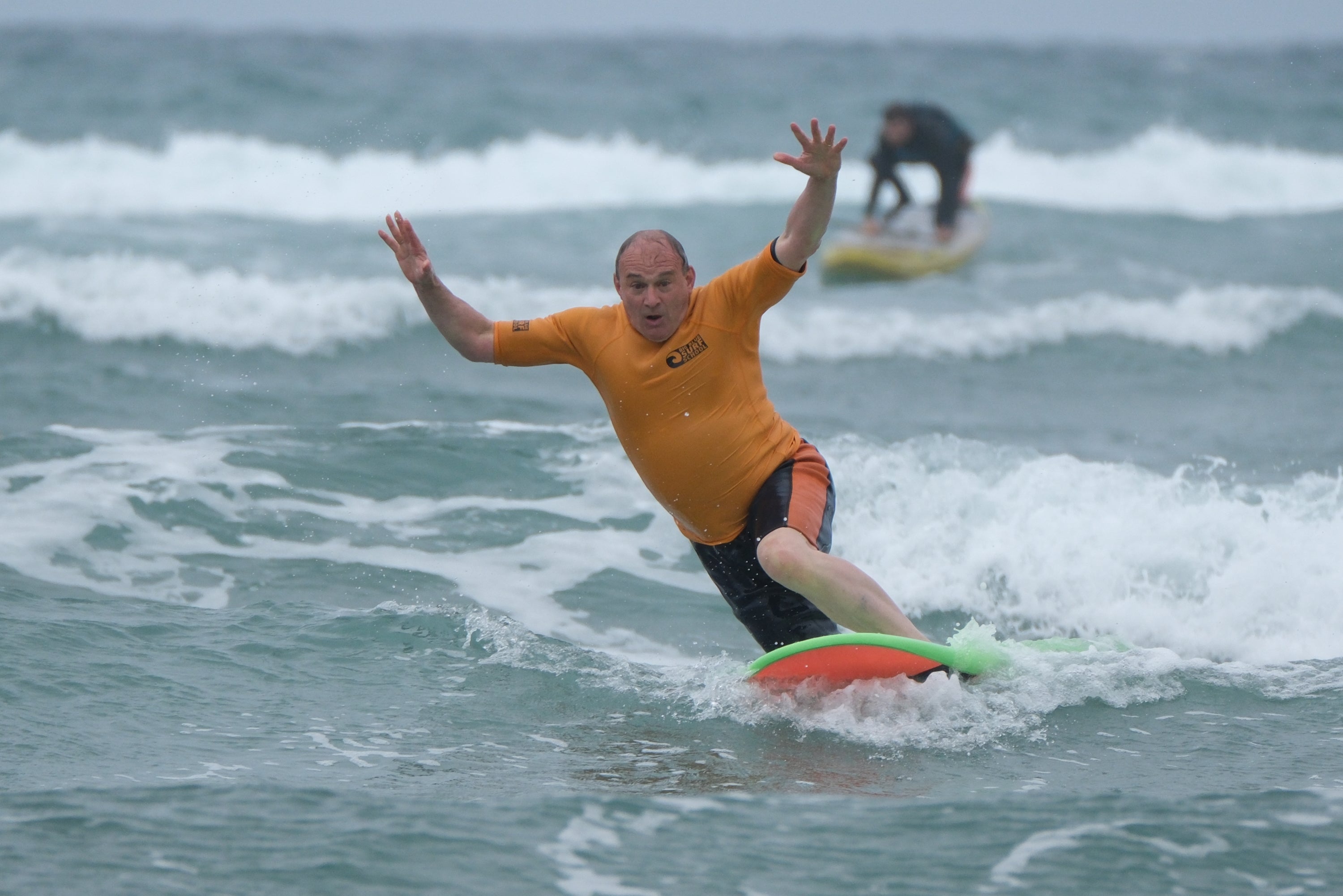 Sir Ed Davey on one of his campaign stunts – a surf lesson in Bude, Cornwall (Matt Keeble/PA)