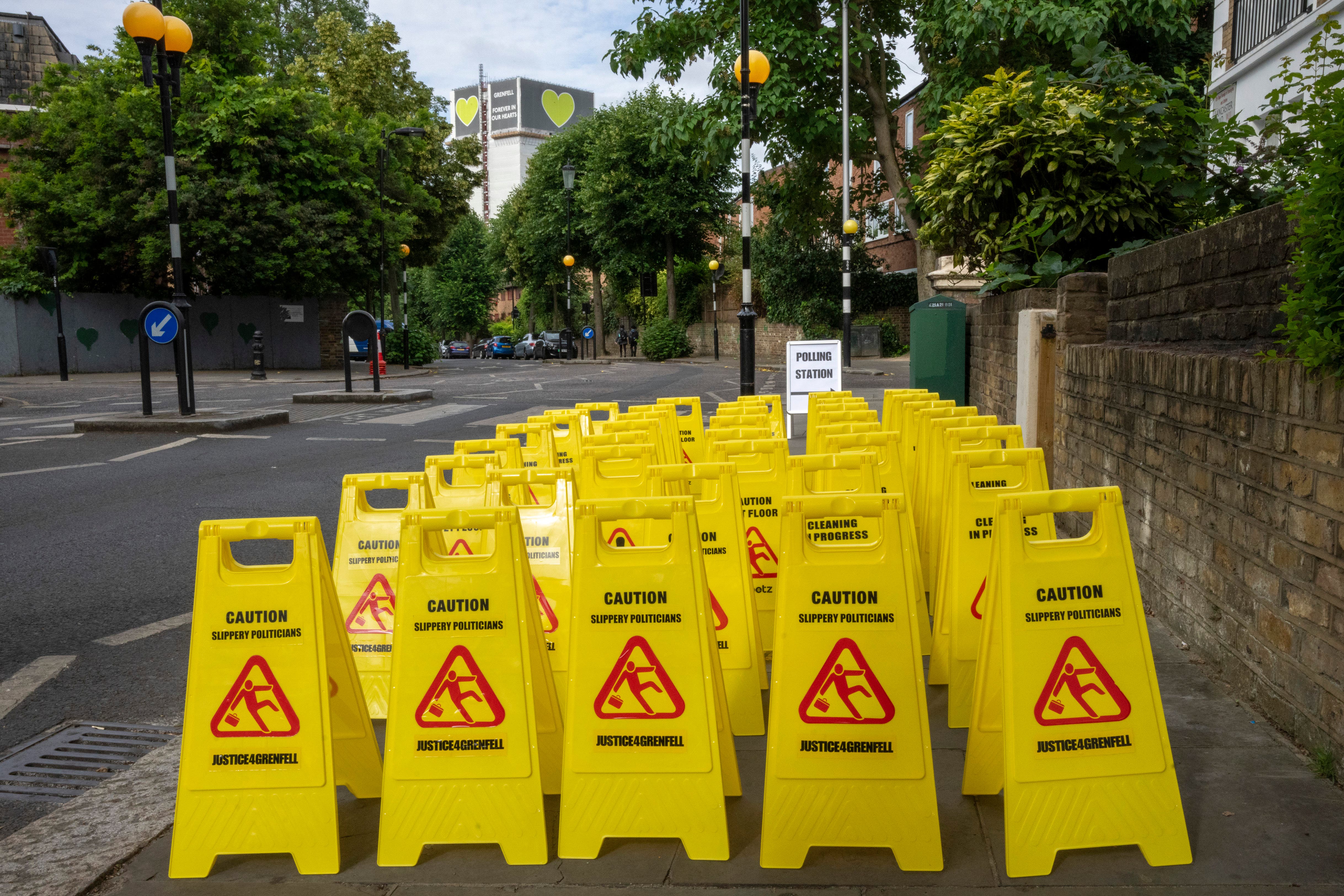 A campaign group has organised signs warning voters to be wary of ‘slippery politicians’ (Jeff Moore/PA)