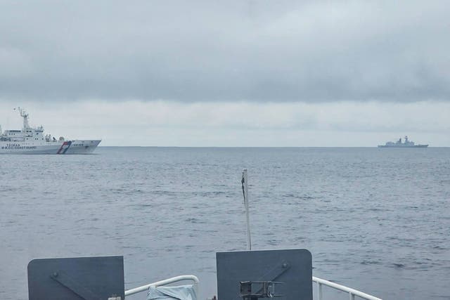 <p>File. This handout photo taken and released by the Taiwan Coast Guard on 23 May 2024 shows a Chinese military ship (R) sailing a few miles north of Pengjia Island, off the coast of northern Taiwan</p>