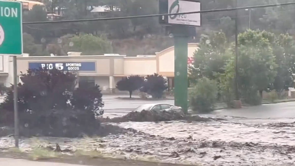 Cars swept away in New Mexico flash floods after wildfires char region