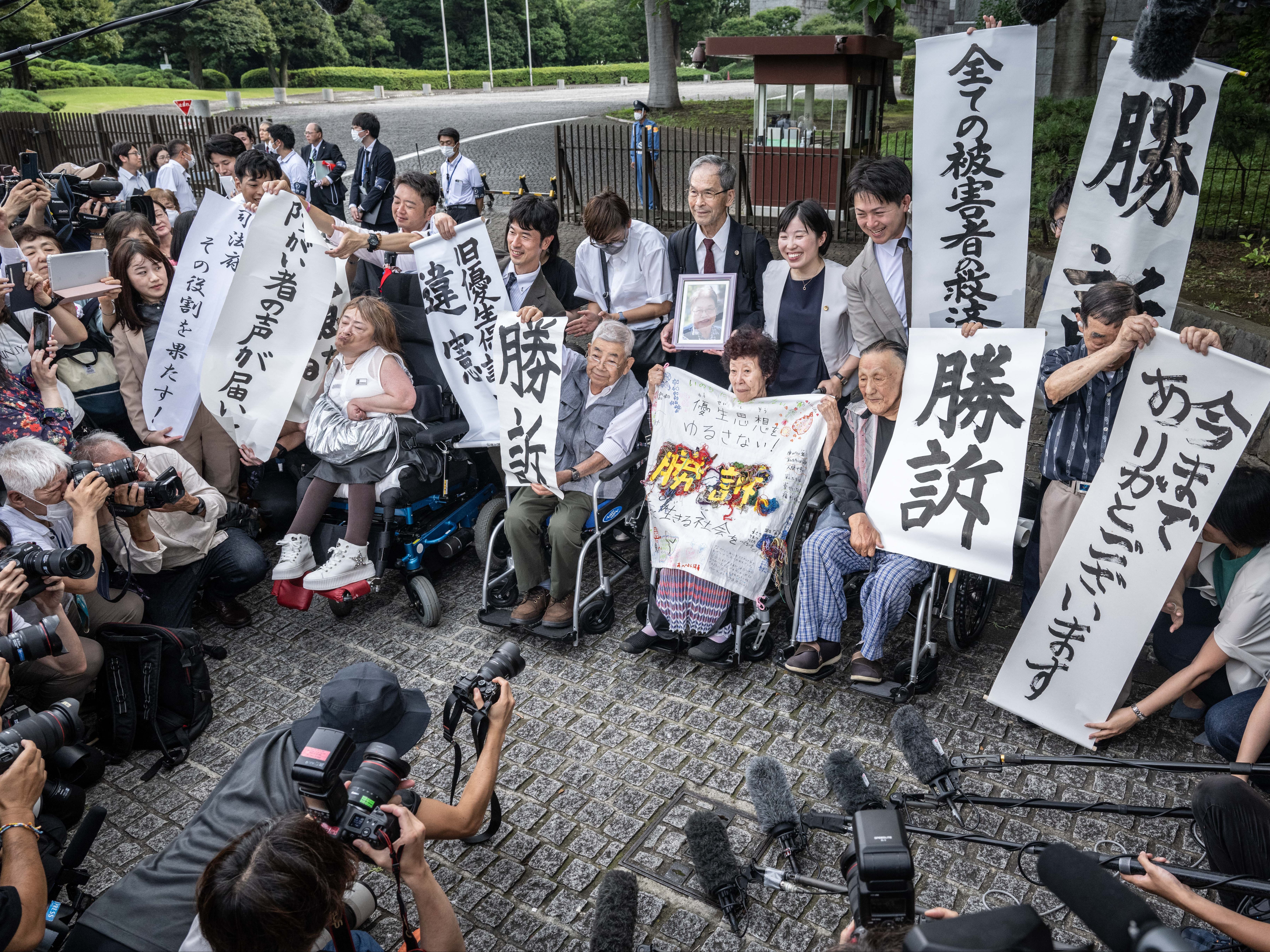 Some victims of the forced sterilisation programme outside the supreme court in Tokyo on 3 July 2024