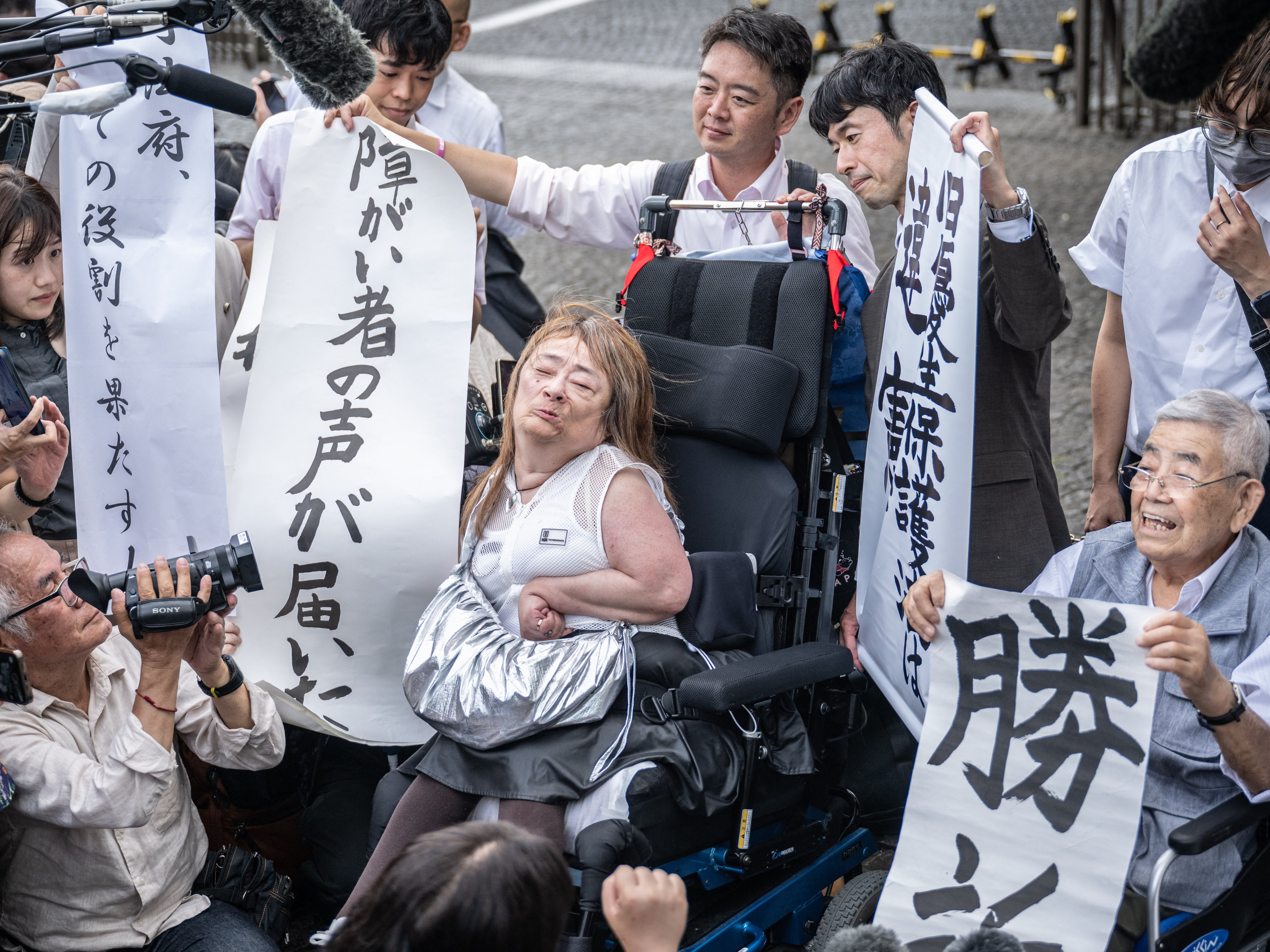 Victims of the forced sterilisation programme outside the supreme court in Tokyo on 3 July 2024