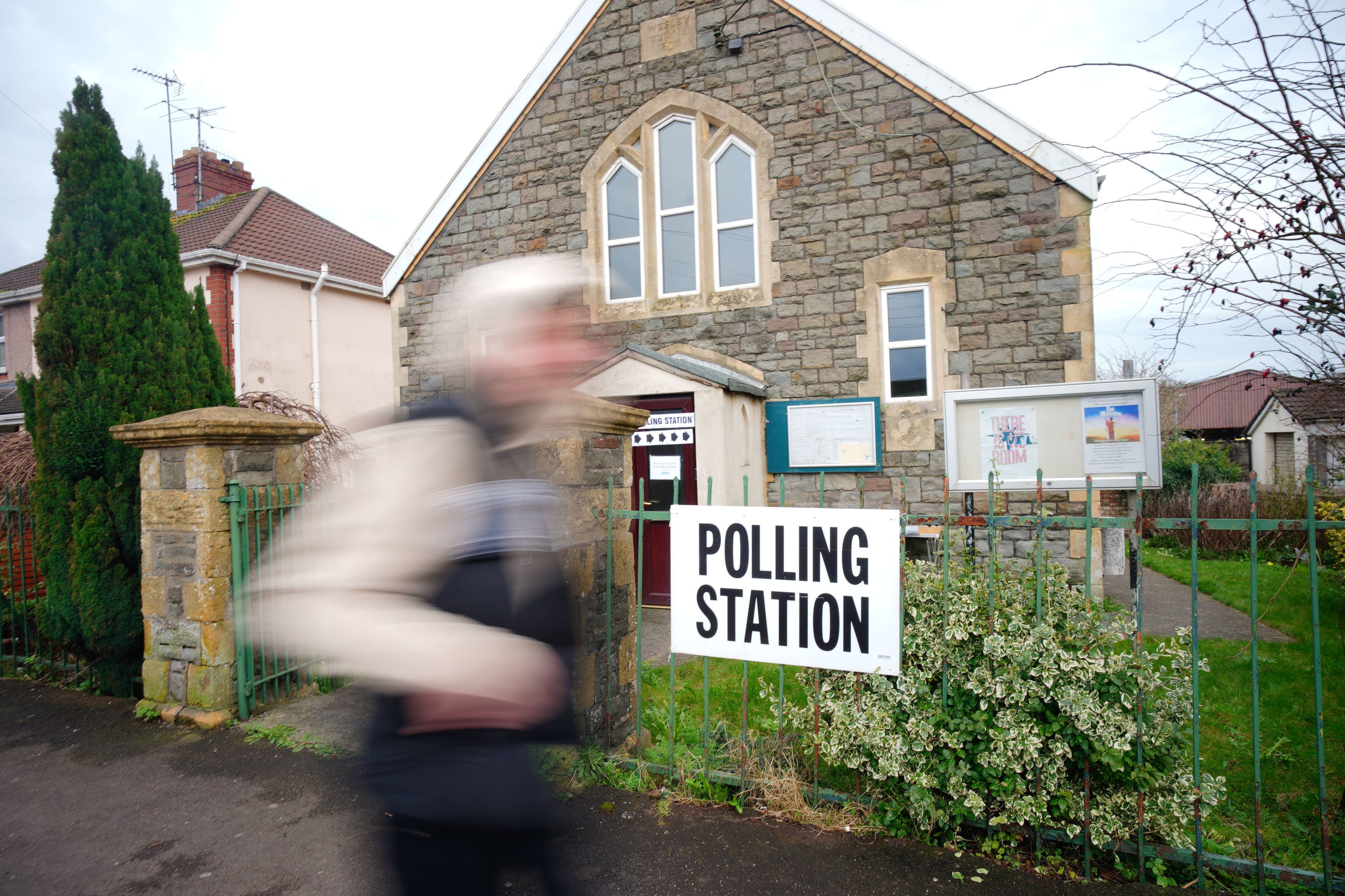 Polling stations are often found in schools, churches and community centres (Ben Birchall/PA)