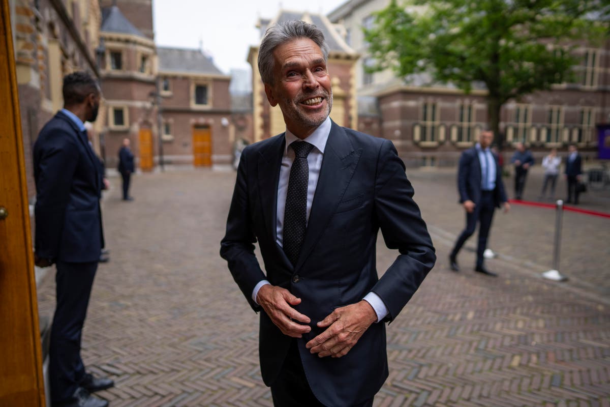 New Dutch leader pledges to cut immigration as the opposition vows to root out racists in cabinet