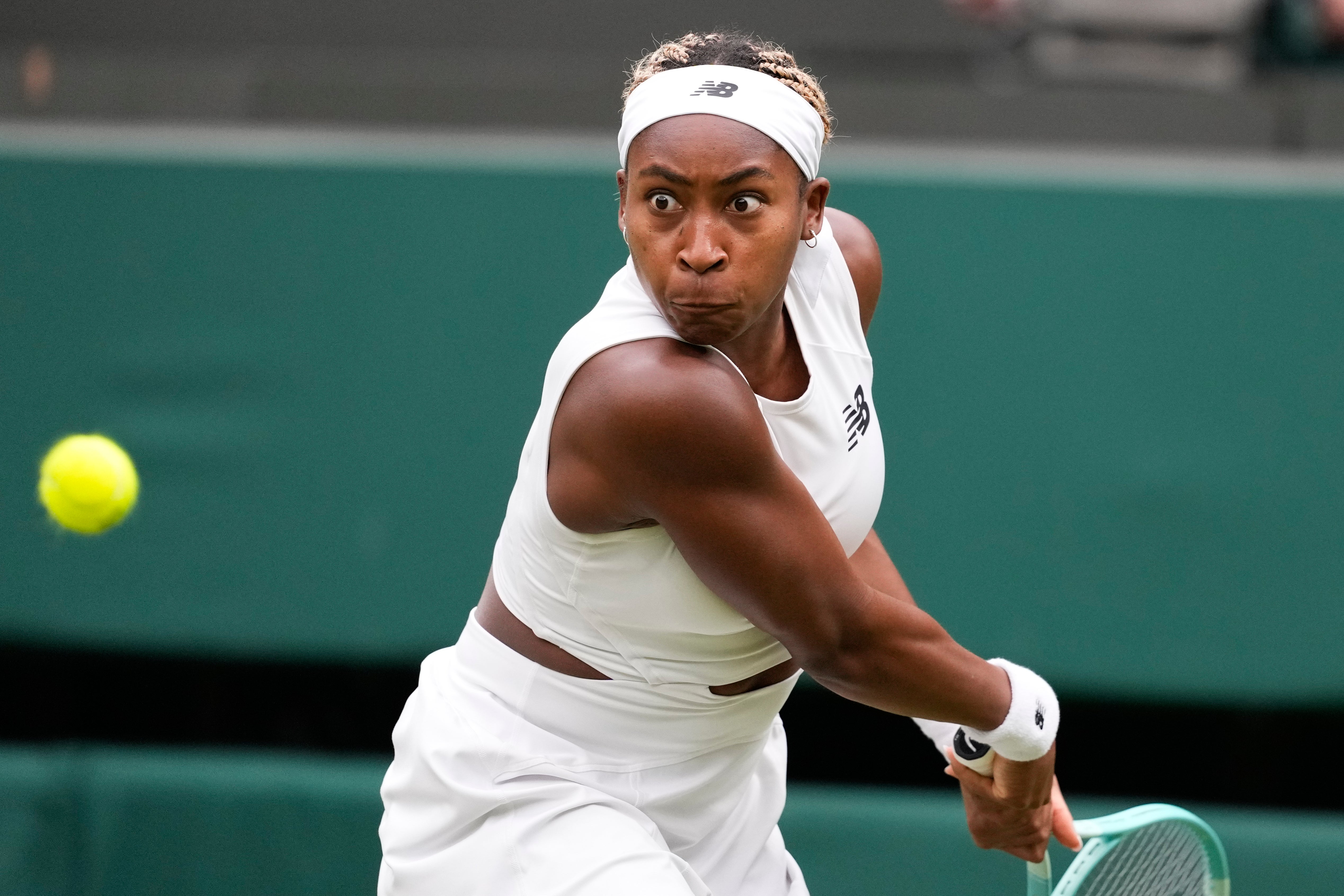 Coco Gauff plays a backhand return to Anca Todoni