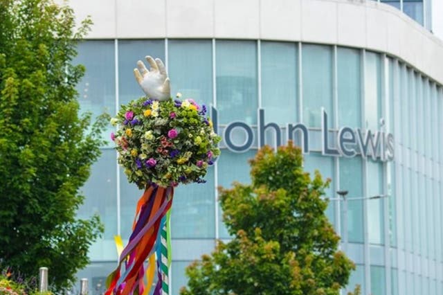 <p>The Lammas tradition sees a big white glove held above Exeter</p>