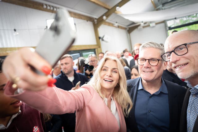 Former Danish Prime Minister Helle Thorning-Schmidt takes a selfie with Labour leader Sir Keir Starmer, who is tipped to win the General Election, on the campaign trail in Wales (Stefan Rousseau/PA)