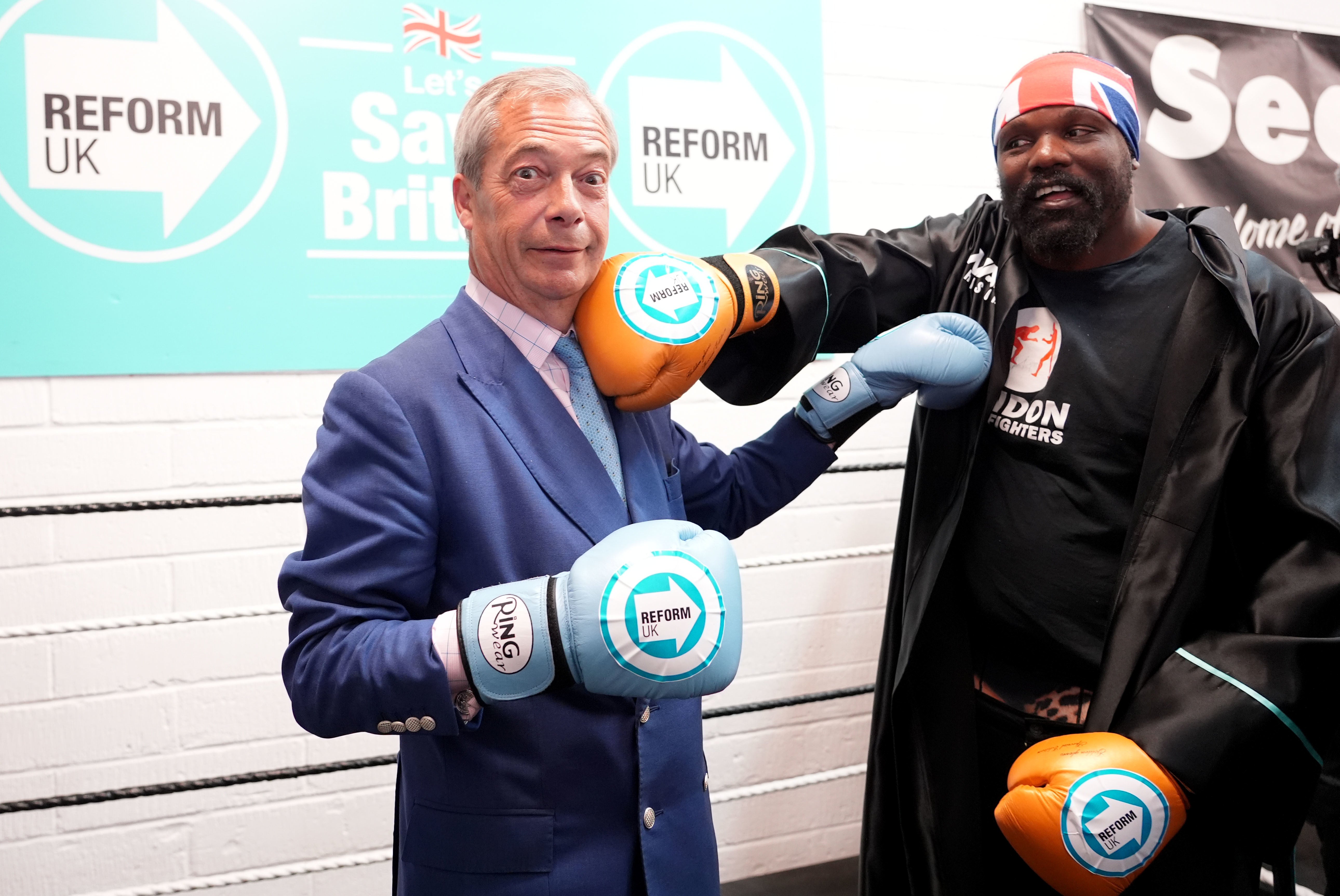 Reform UK leader Nigel Farage and boxer Derek Chisora at a boxing gym in Clacton (Ian West/PA)