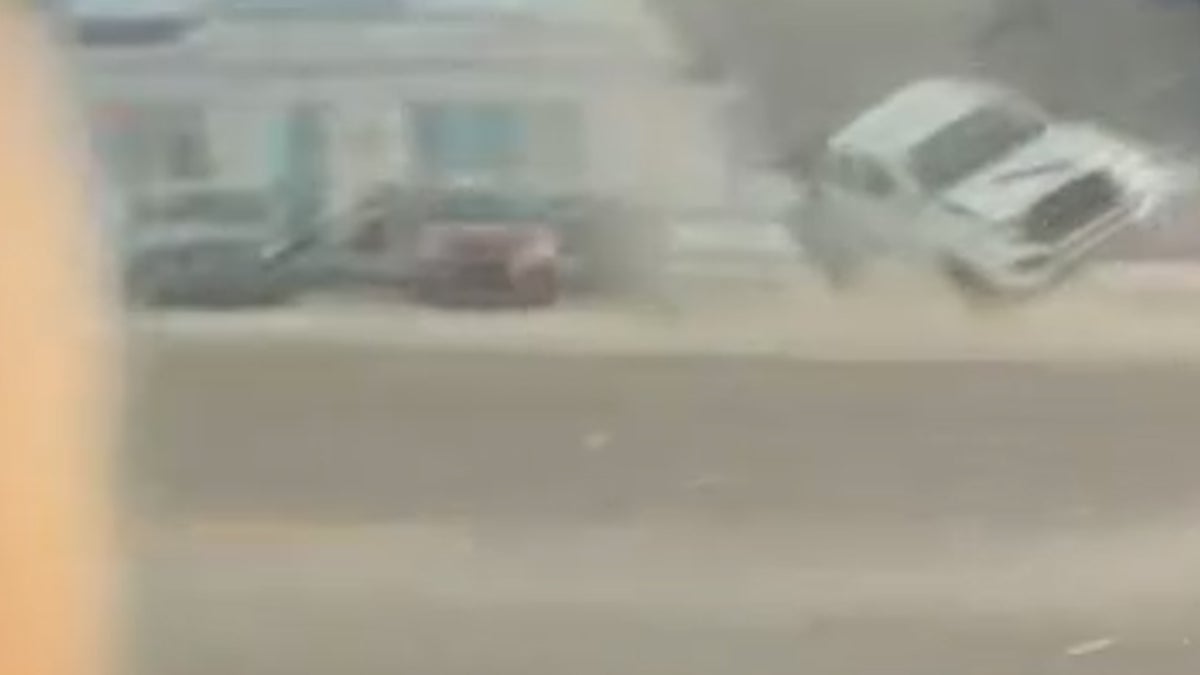 Moment Florida tornado lifts parked truck into traffic