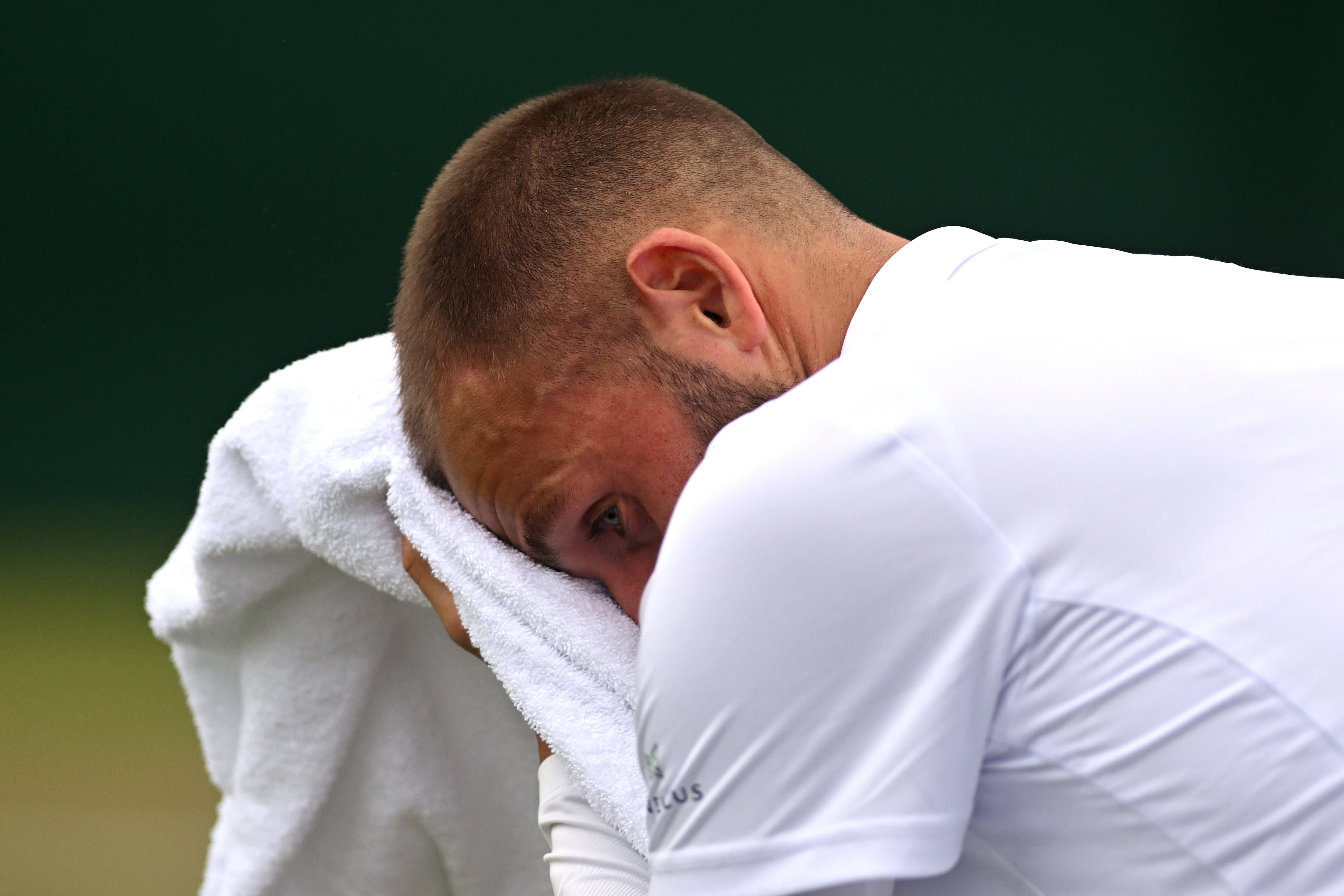 Dan Evans was beaten by Alejandro Tabilo in the first round of Wimbledon