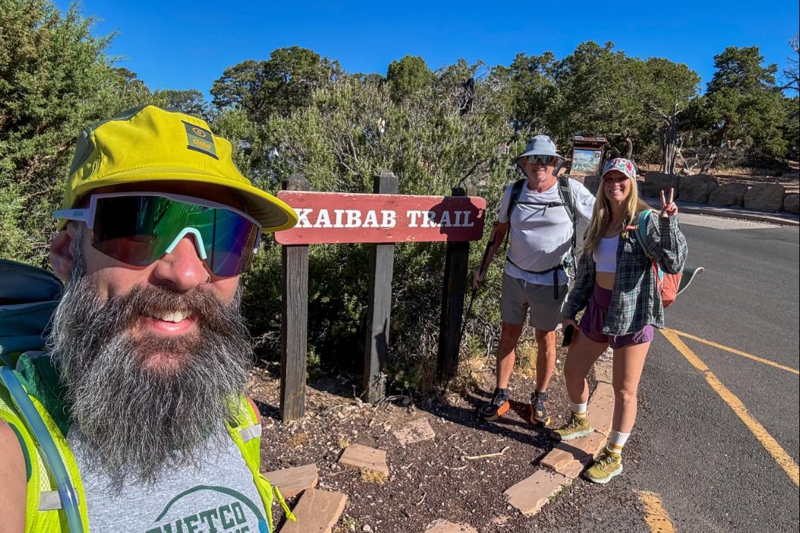 Scott Sims (center right) is pictured with his niece Jessica Ryan, on a Grand Canyon trail, who issued a warning to other hikers following her uncle’s death