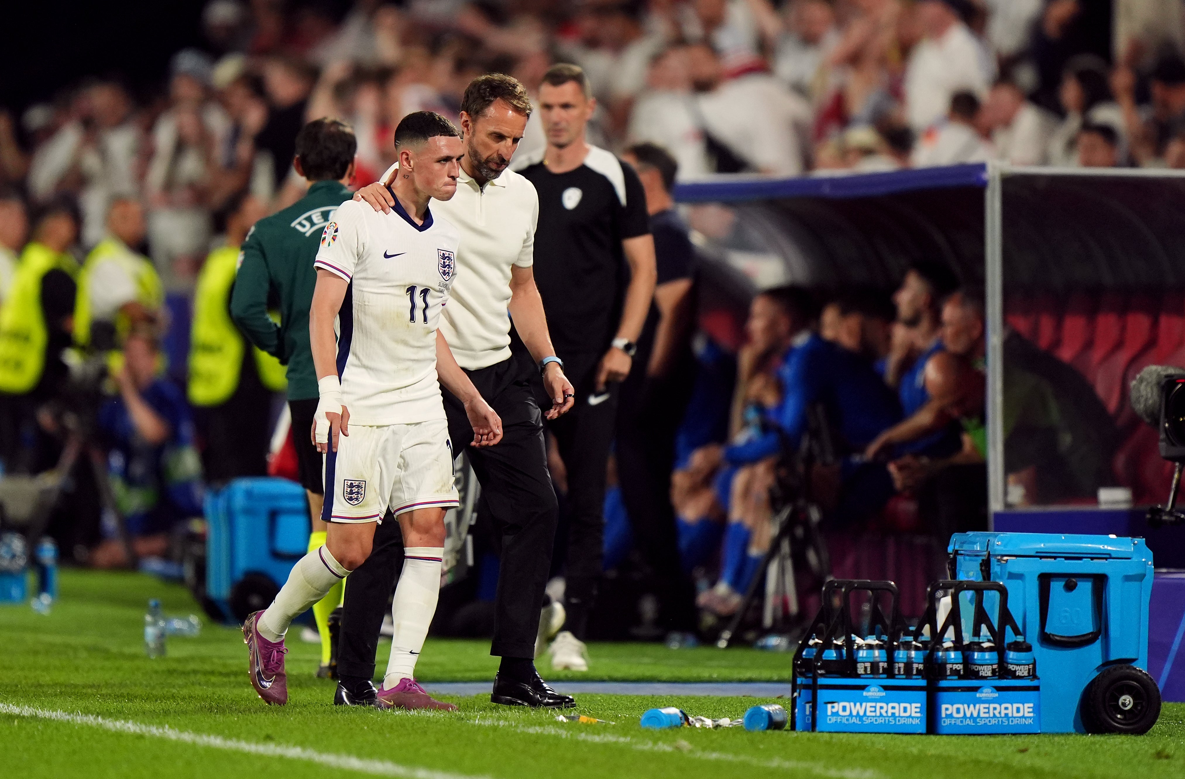 England manager Gareth Southgate and Phil Foden during the Euro 2024 group game against Slovenia (Bradley Collyer/PA)