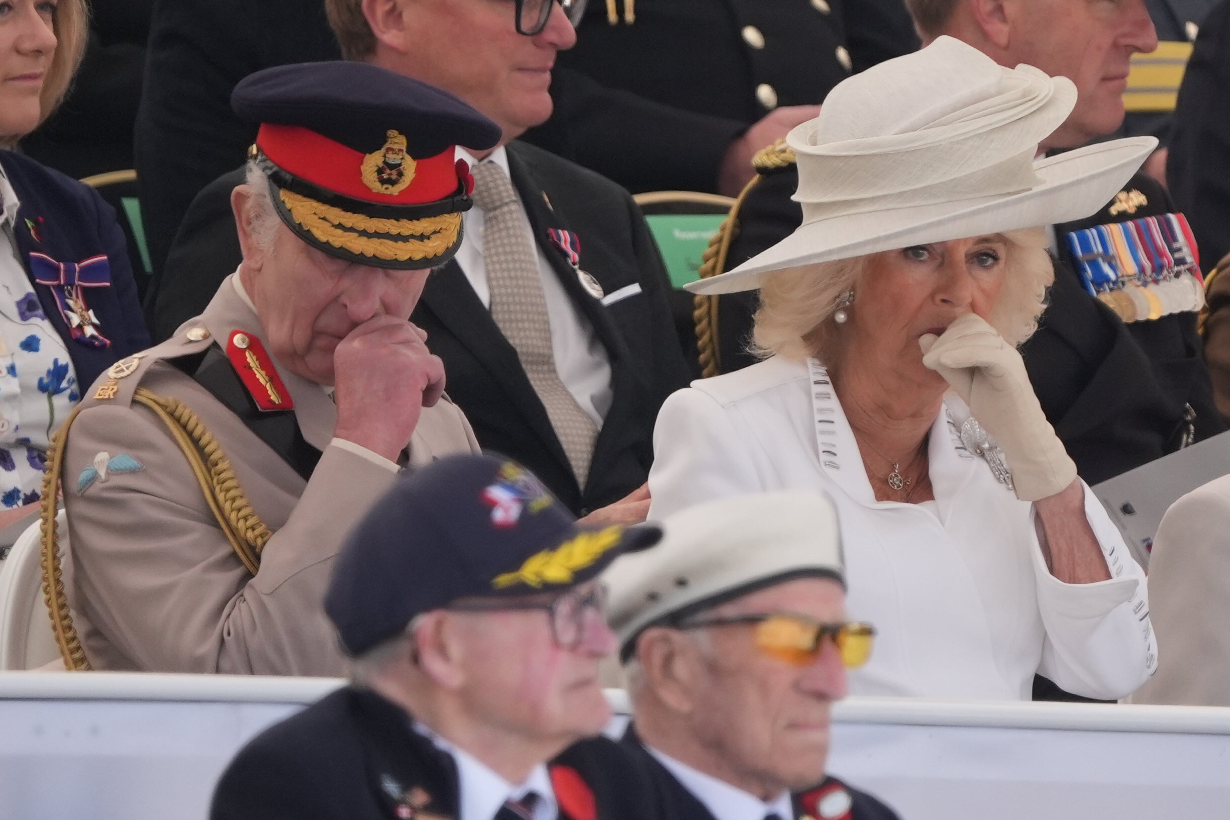 The King and Queen appear emotional during the UK national commemorative event for the 80th anniversary of D-Day in Ver-sur-Mer, Normandy, France (Gareth Fuller/PA)