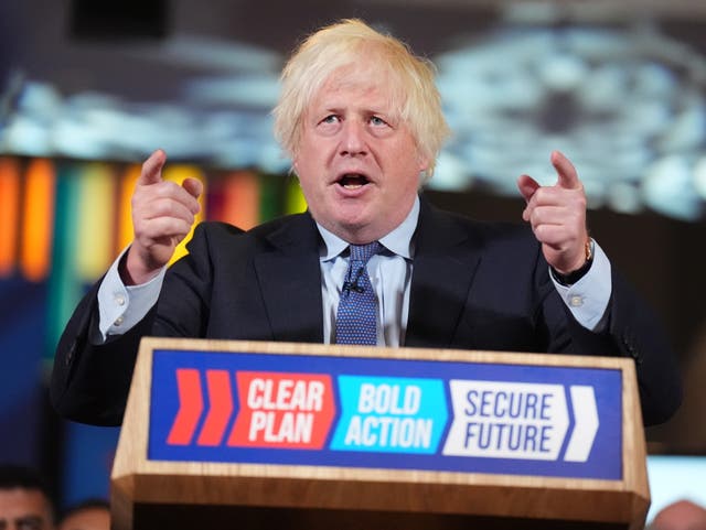 <p>Boris Johnson addresses a Tory election rally (James Manning/PA)</p>