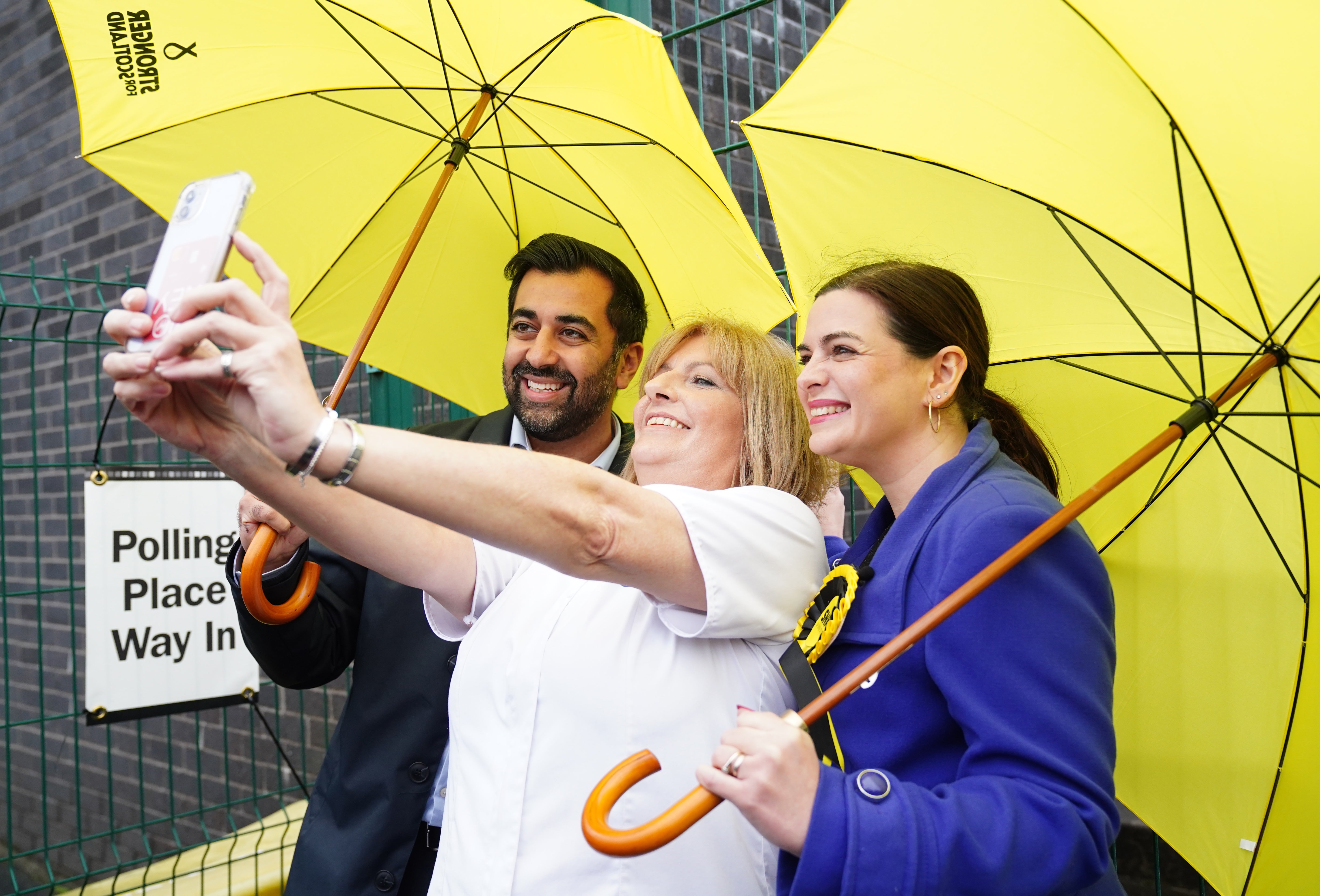 People can take selfies outside polling stations, but not inside (Jane Barlow/PA)