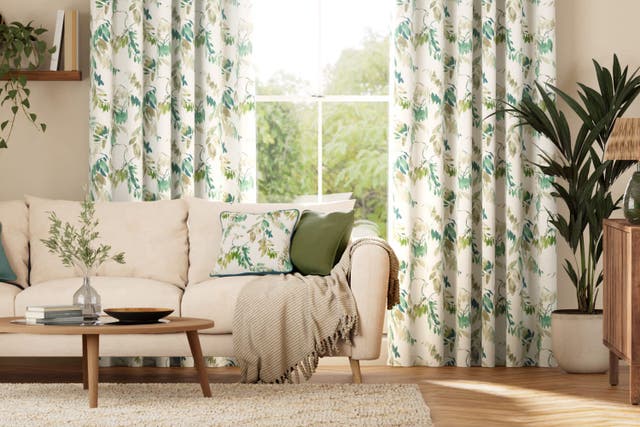 Keeping windows open and curtains closed can help keep your home cool (Blinds 2go/PA)