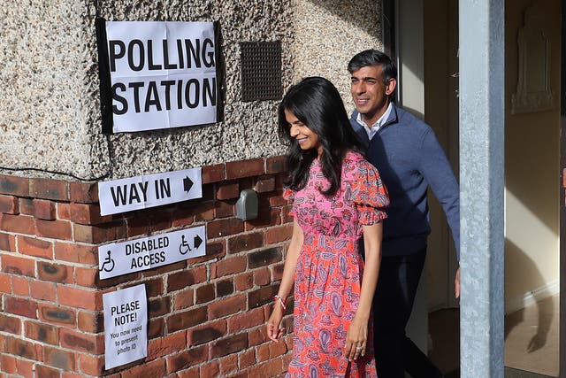 <p>Britain’s Prime Minister Rishi Sunak and his wife Akshata Murty leave a polling station after voting near Richmond</p>