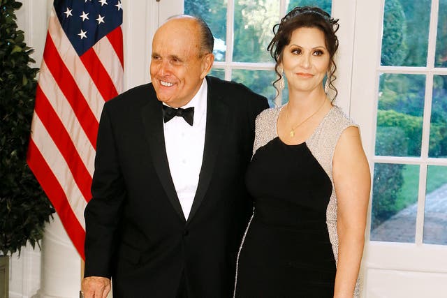 <p>Former New York City Mayor Rudy Giuliani and his alleged girlfriend Maria Ryan arrive for the State Dinner at the White House on September 20 2019</p>