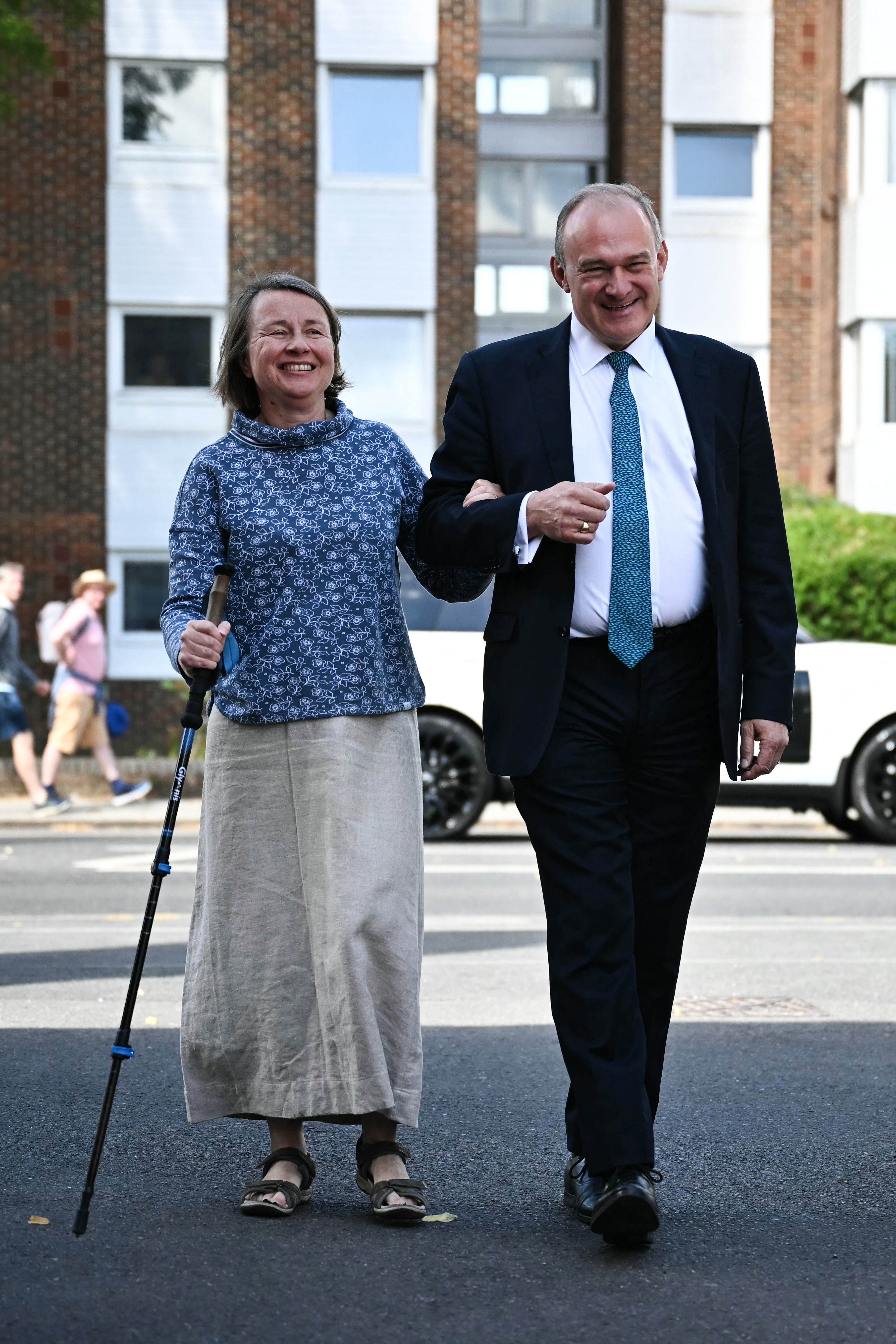 Sir Ed Davey and his wife Emily Gasson arrive to cast their votes in the 2024 General Election at Surbiton Hill Methodist Church in Surbiton, south west London