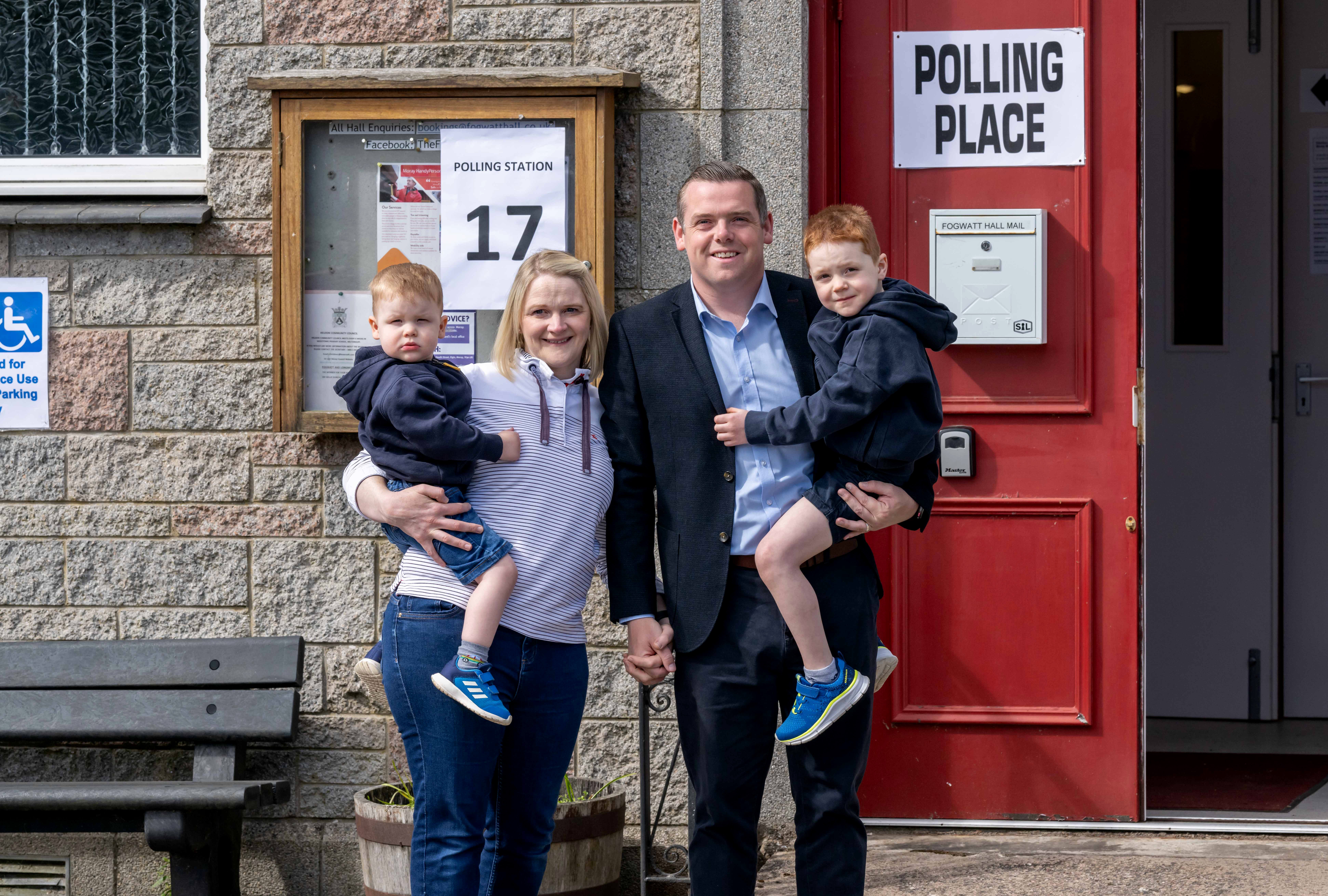 Scottish Conservative leader Douglas Ross arrived with his family to cast his vote (Michal Wachucik/PA)