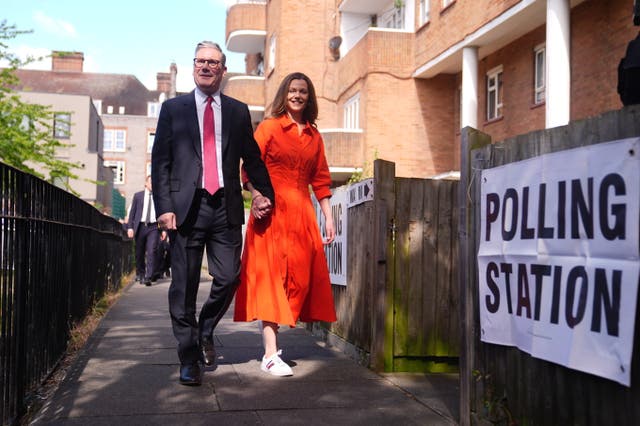 <p>Labour leader Sir Keir Starmer and his wife Victoria arrive at Willingham Close Tenants and Residents Association Hall in north London (James Manning/PA)</p>