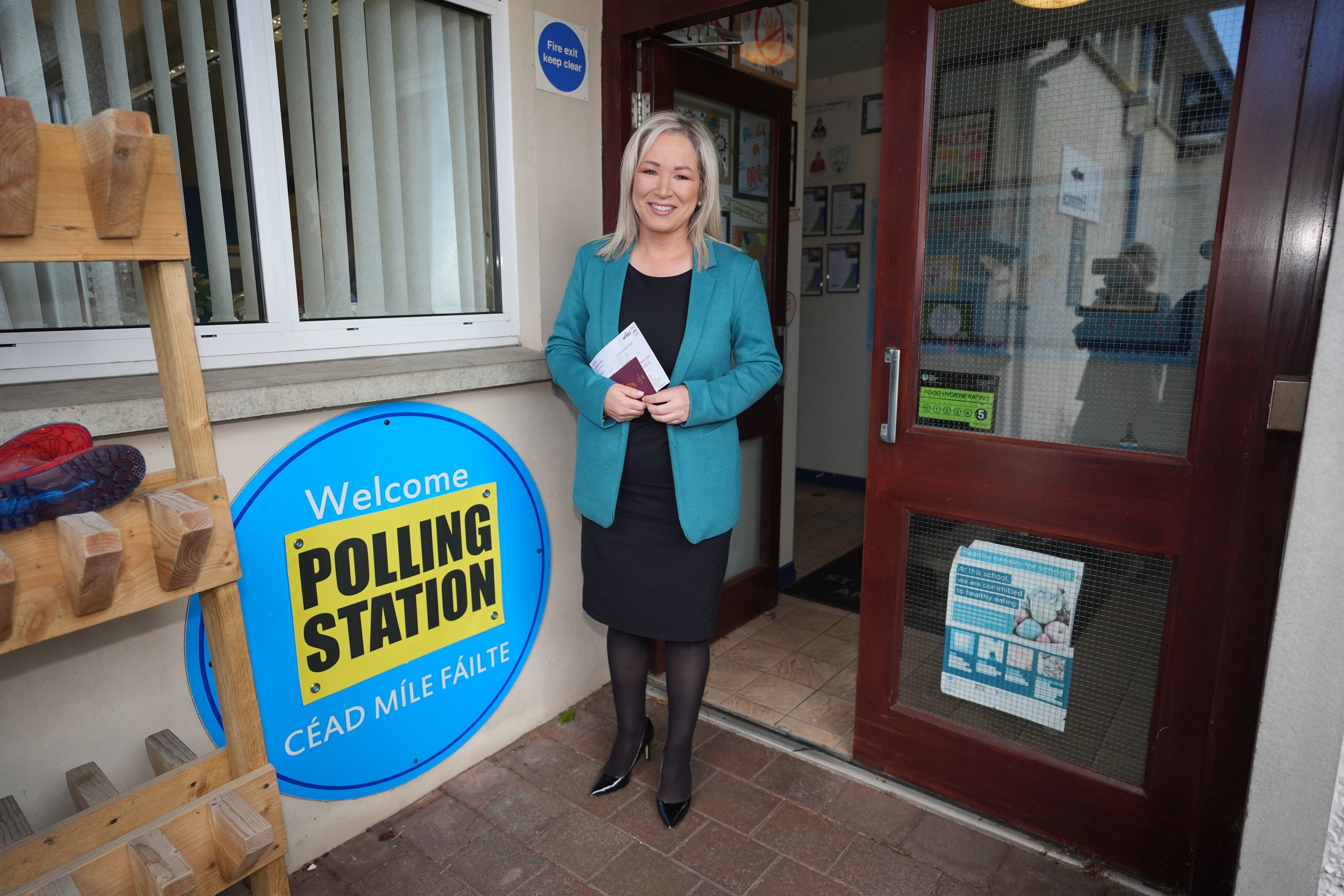 Sinn Fein vice president Michelle O’Neill arrives to cast her vote at St Patrick’s Primary School in Coalisland (Niall Carson/PA)