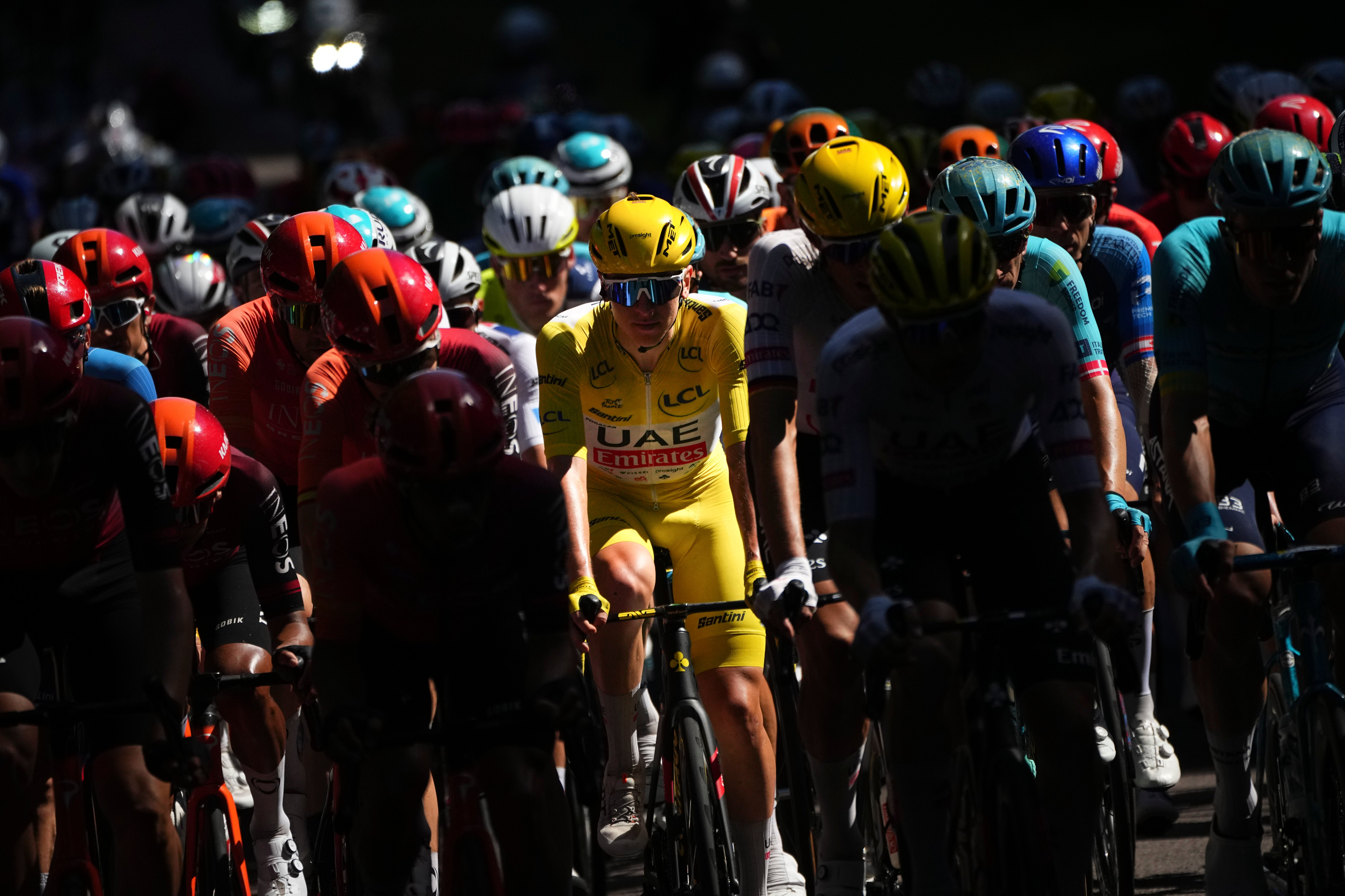 Tadej Pogacar kept his lead in the yellow jersey despite some worries in the crosswinds (Daniel Cole/AP)