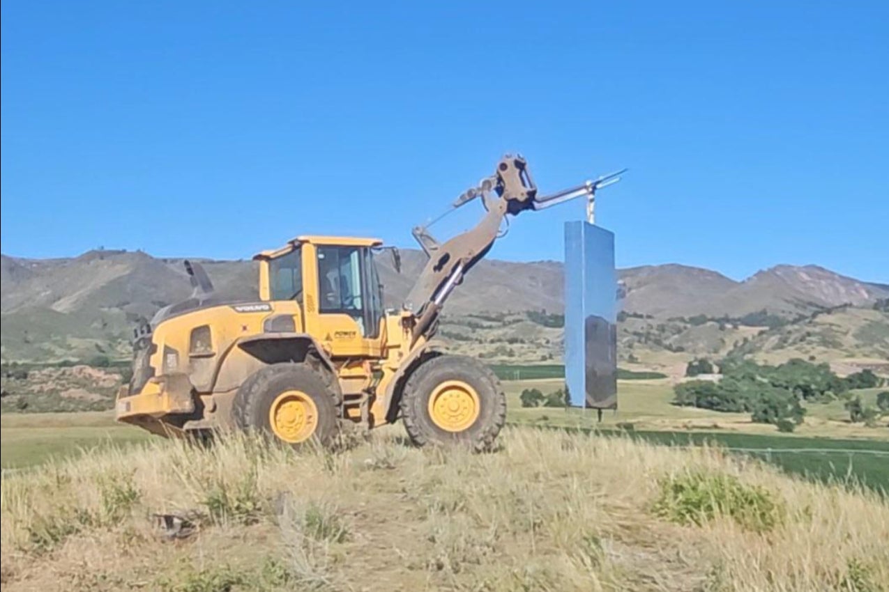 A mysterious monolith that appeared in a Colorado dairy farm has been removed by the owners after too many visitors came to view the strange object
