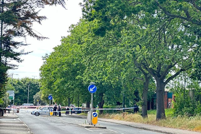 <p>The crime scene in Feltham, west London </p>