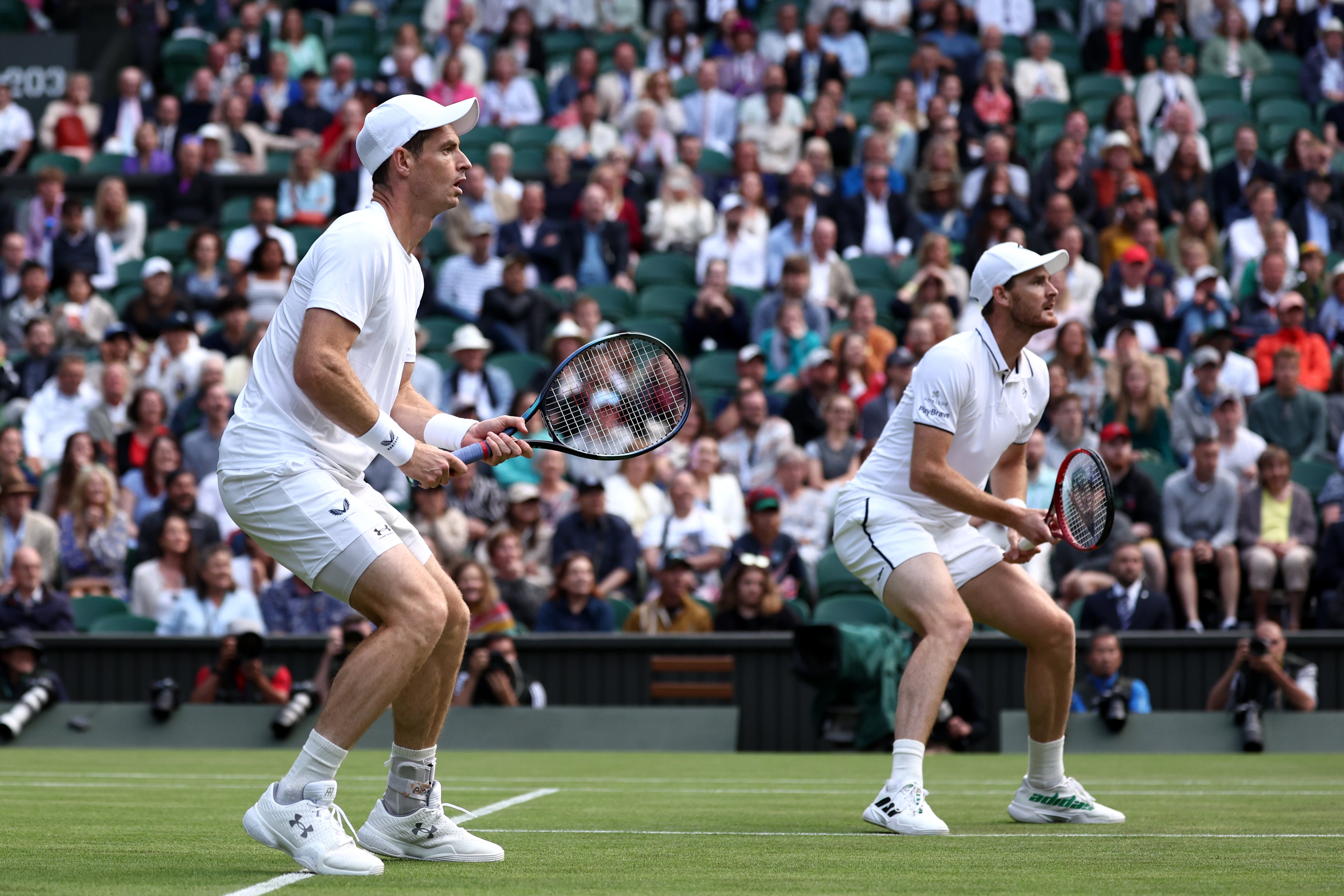 Andy Murray (left) with brother Jamie in the men’s doubles