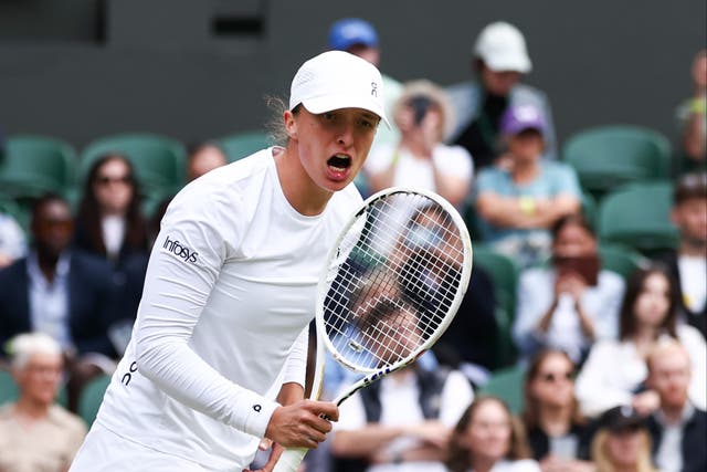 <p>Iga Swiatek celebrates winning match point against Petra Martic</p>