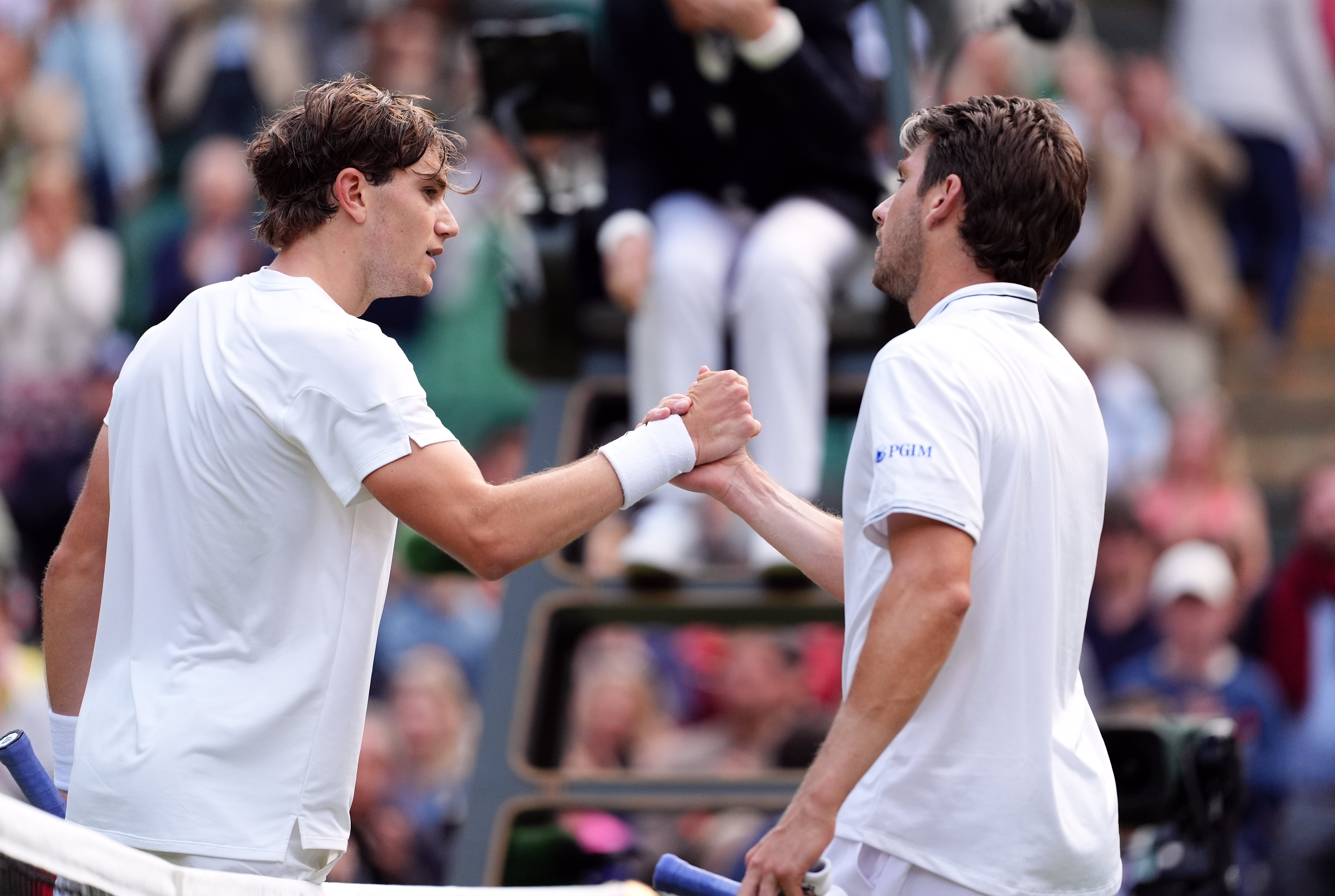 Jack Draper (left) and Cameron Norrie shake hands after their match (John Walton/PA)