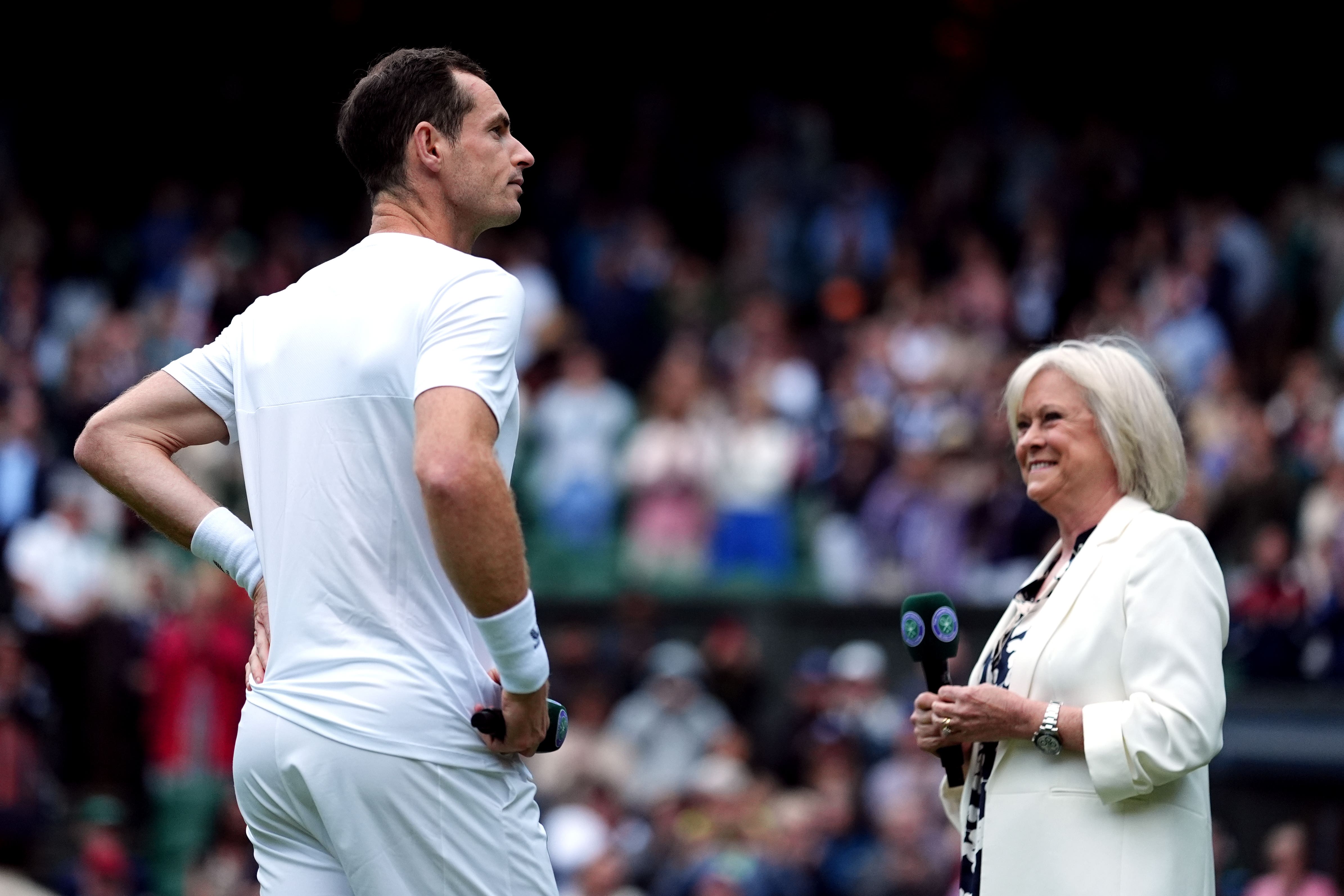 Andy Murray with Sue Barker at Wimbledon after his men’s doubles match with his brother Jamie (Zac Goodwin/PA)