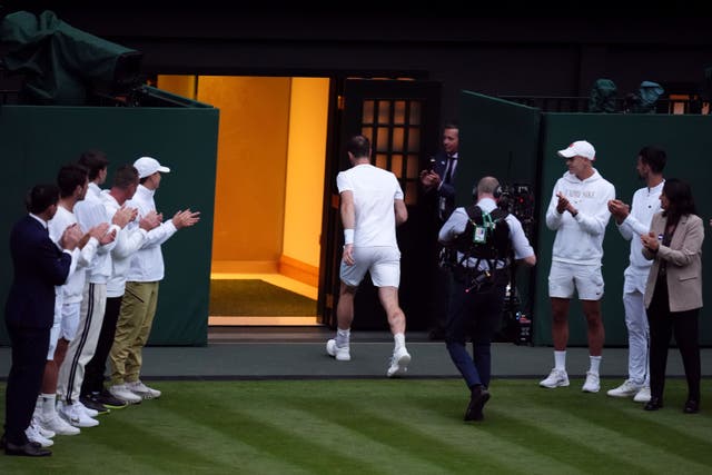 Andy Murray leaves Centre Court (John Walton/PA)