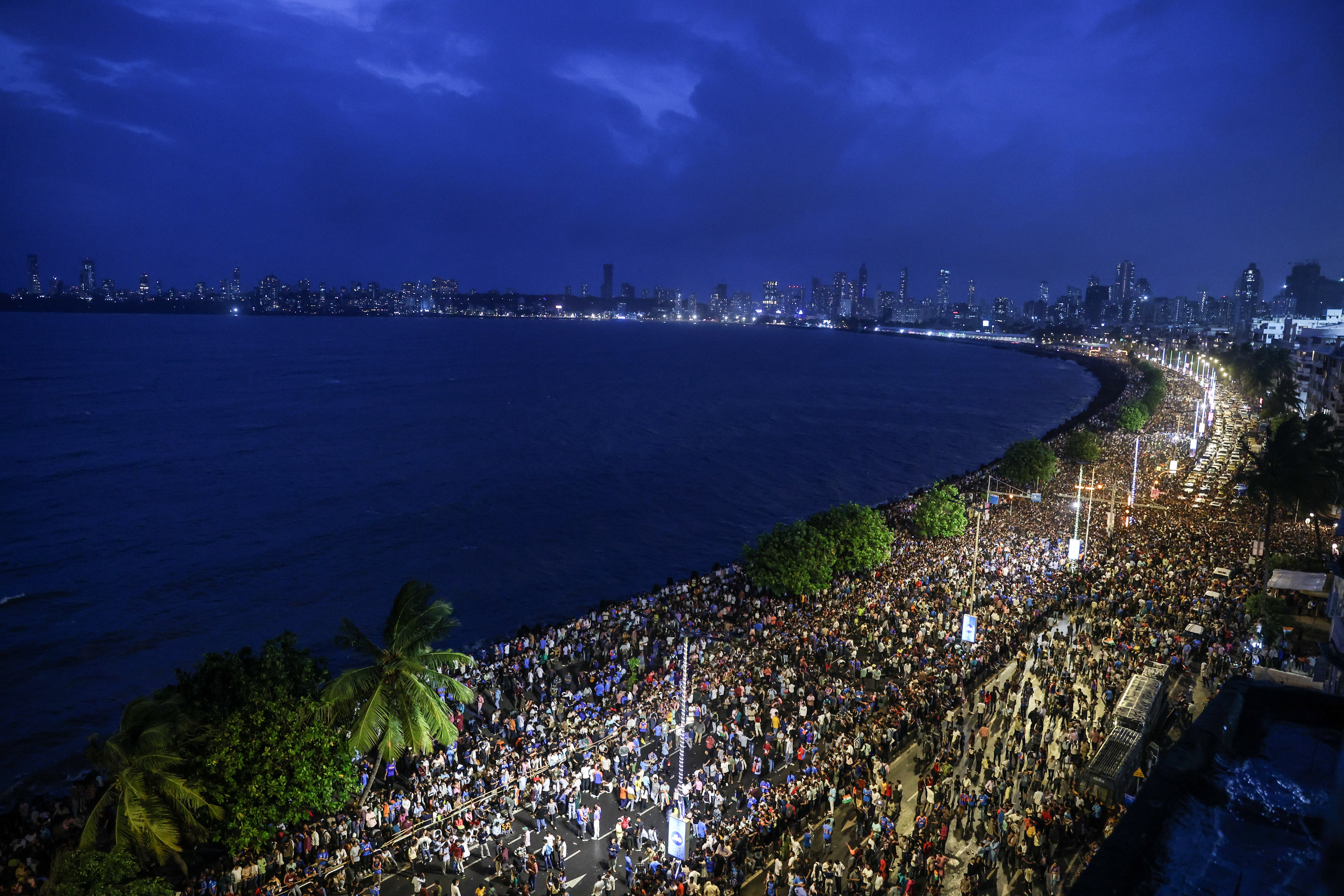Fans gather at Marine Drive ahead of the Indian cricket team’s victory parade in Mumbai
