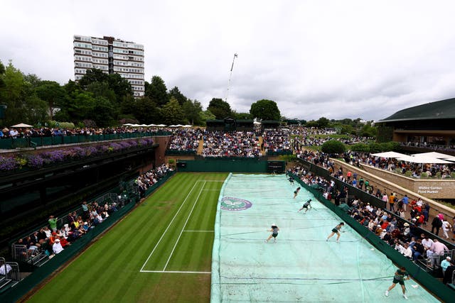 <p>Rain covers will be needed to today to protect Wimbledon’s open courts</p>