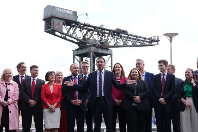 Scottish Labour leader Anas Sarwar with some of the newly elected Labour MPs at Four Winds Pavilion in Glasgow (Andrew Milligan/PA)