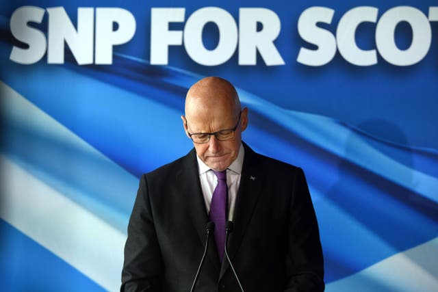 <p>John Swinney addresses reporters at Edinburgh’s Port of Leith distillery after disastrous Westminster election results</p>