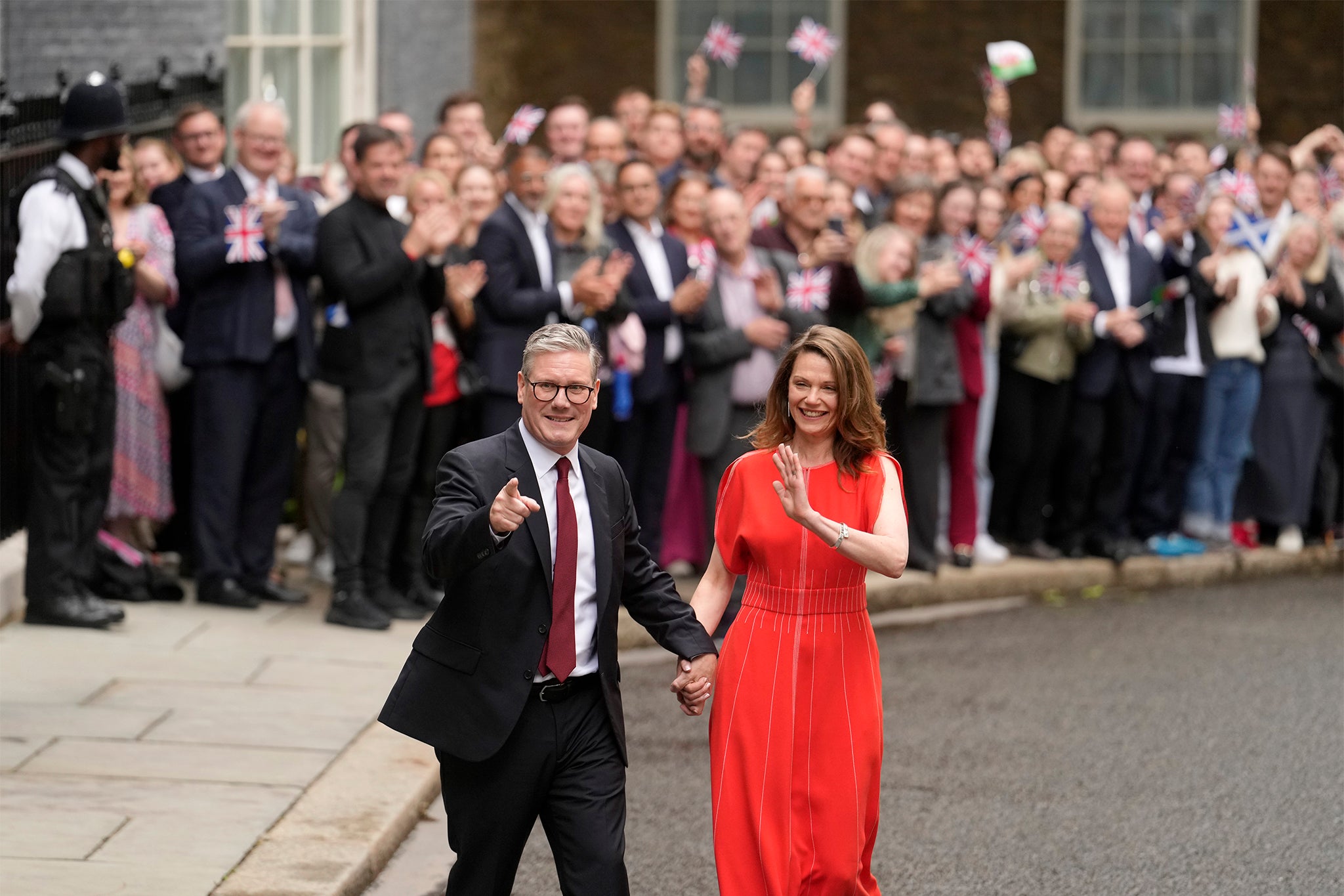 ‘Beaming from ear to ear, Starmer strolled up and down the crowd with wife Victoria while the cheers rang out’