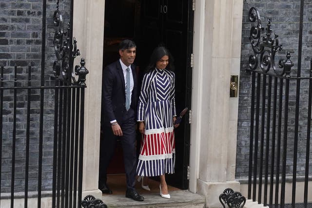 Outgoing prime minister Rishi Sunak joined by wife Akshata Murty as they prepared to leave Downing Street (Gareth Fuller/PA)