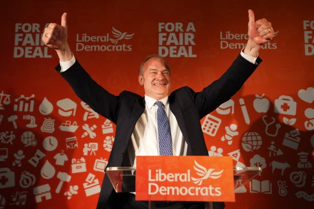 <p>Sir Ed Davey celebrates a record night for the Liberal Democrats (James Manning/PA)</p>