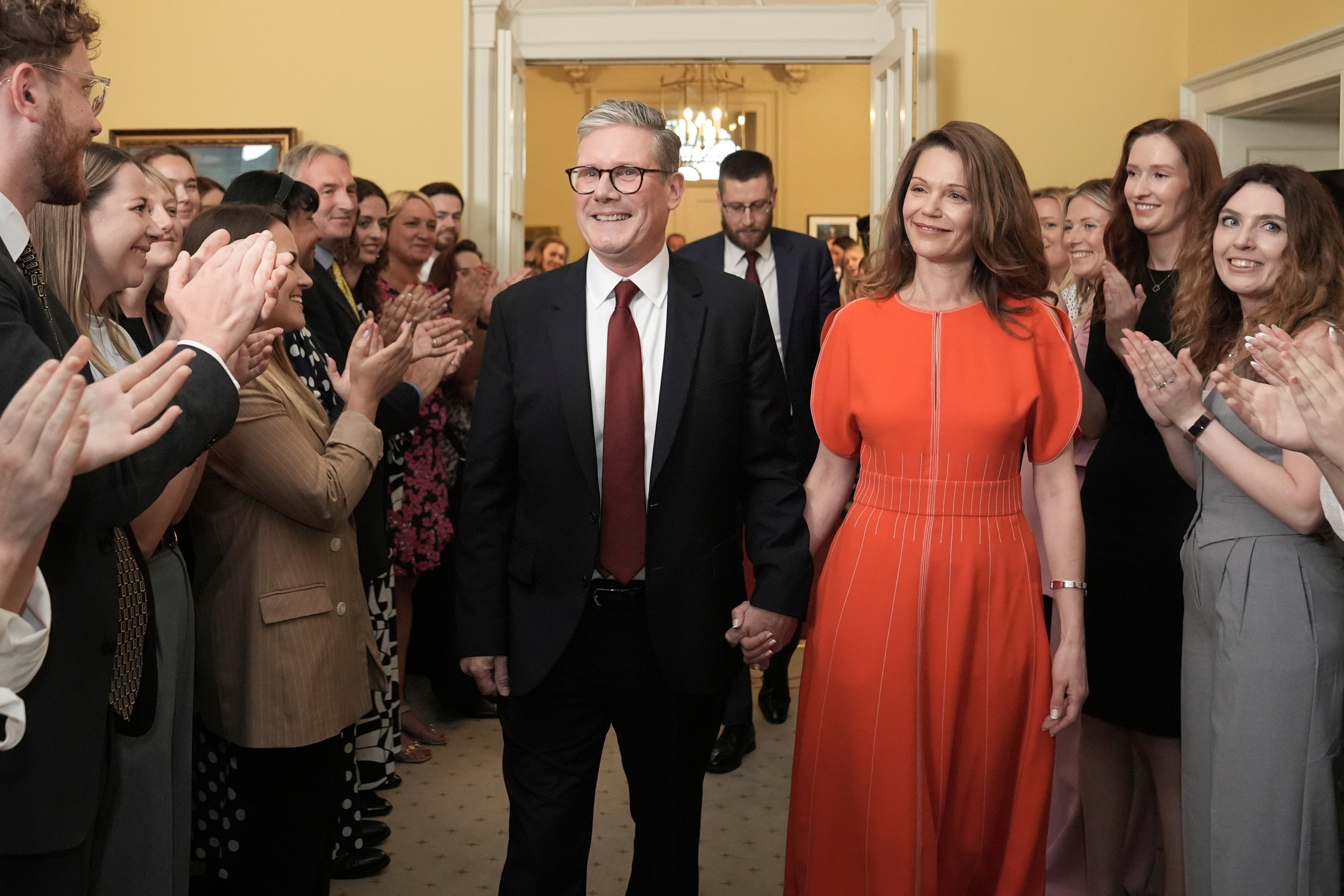 Newly elected Keir Starmer and his wife Victoria enter their official London residence at No 10 Downing Street for the first time