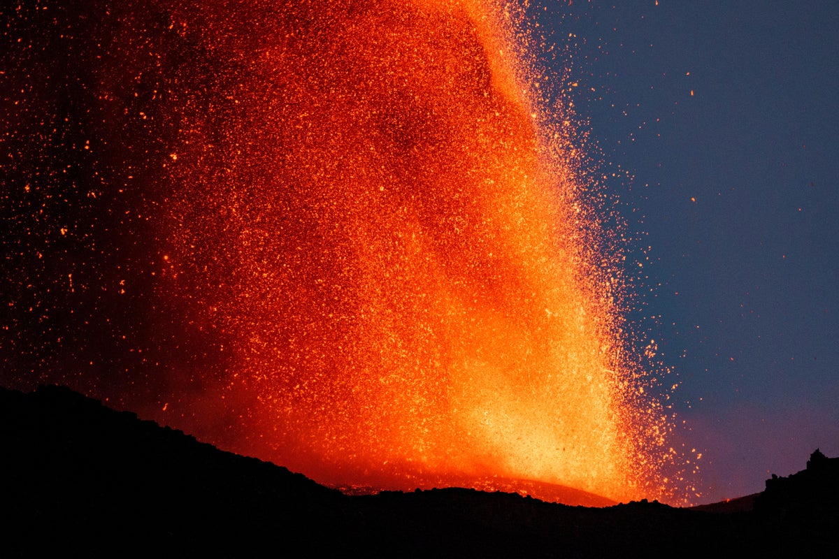 Mount Etna spews lava and ash into air as spectacular eruption unfolds