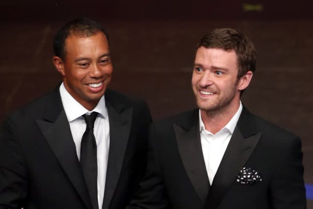 <p>Tiger Woods and Justin Timberlake at the Ryder Cup in 2012</p>