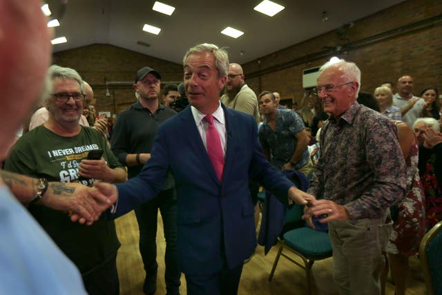 <p>Reform party leader Nigel Farage joins party chairman Richard Tice on the campaign trail</p>