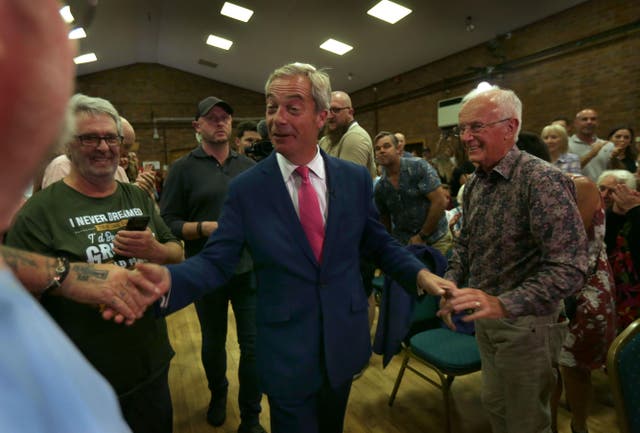 <p>Reform party leader Nigel Farage joins party chairman Richard Tice on the campaign trail</p>