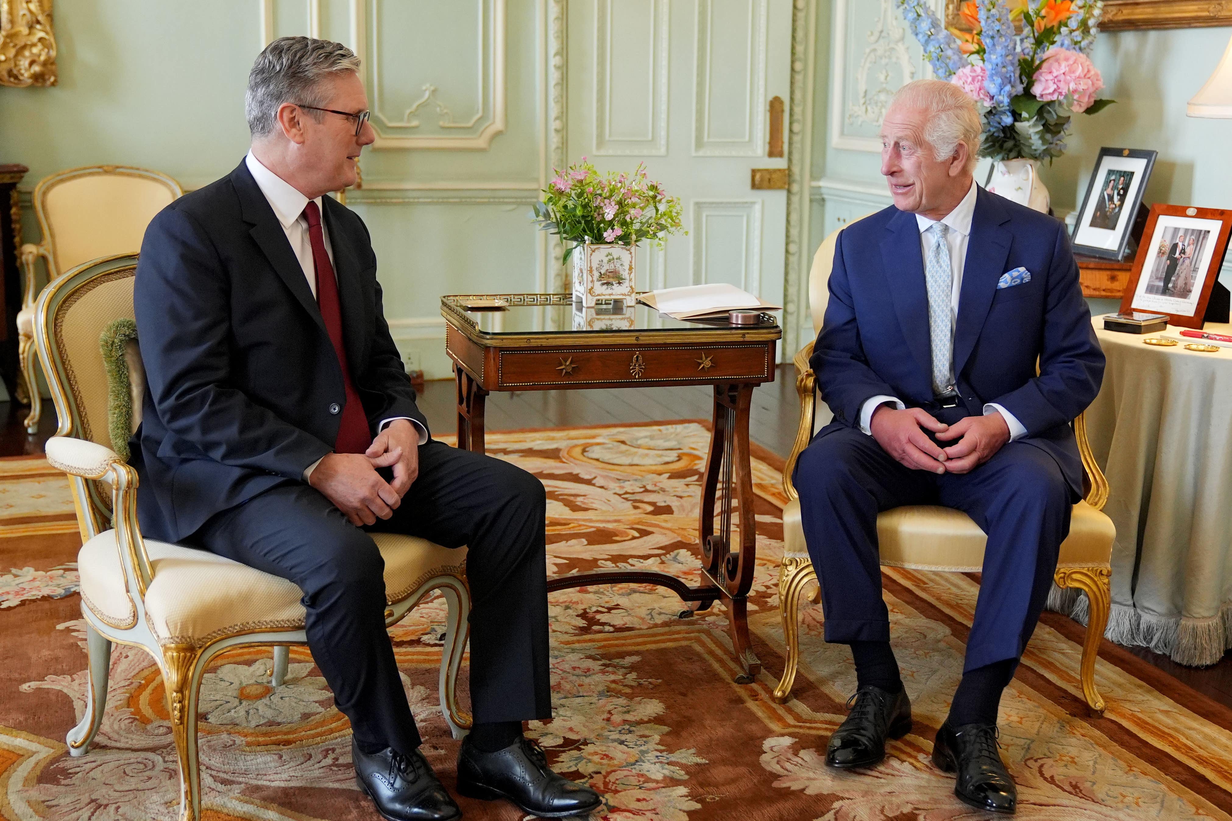 King Charles III speaks with Sir Keir Starmer during an audience at Buckingham Palace, London, where he invited the leader of the Labour Party to become Prime Minister and form a new government (Yui Mok/PA)